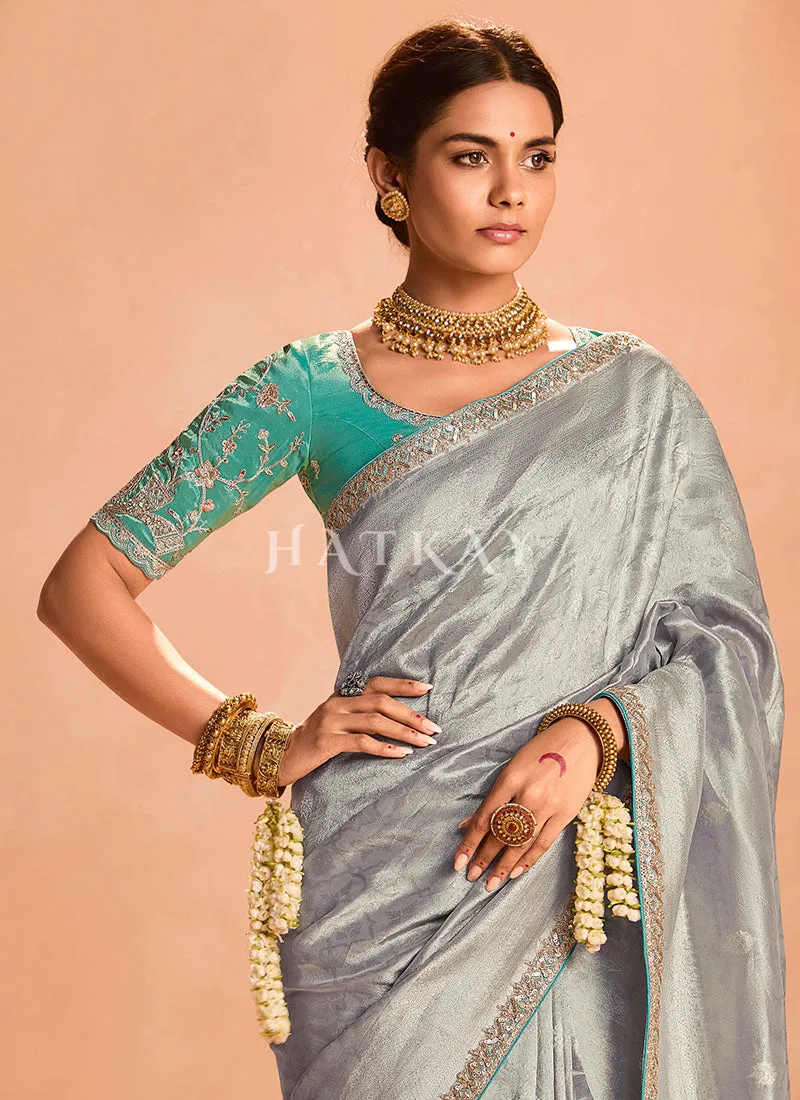 Silver Grey And Teal Embroidery Saree