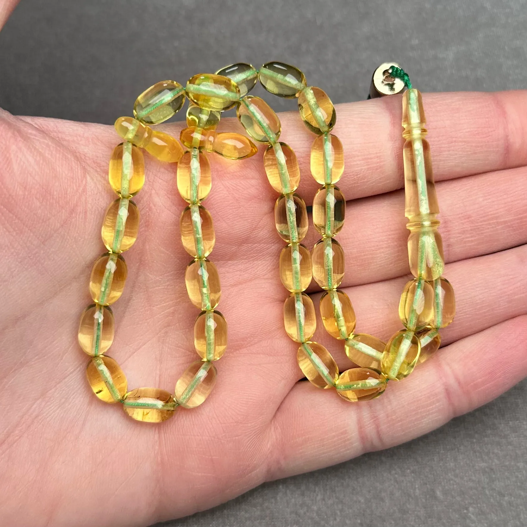 TRANSPARENT AMBER MISBAHA 6,6x10,3mm 11,8g